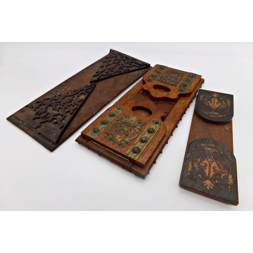 121 - Victorian oak bookslide with gilt metal strap work and cabochons, with studded decoration around the... 