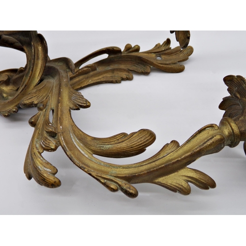 593 - Pair of French early 20th century Louis XV style gilt cast metal three branch acanthus wall sconce, ... 