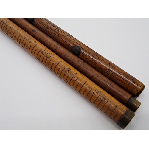 133 - Three antique yardsticks