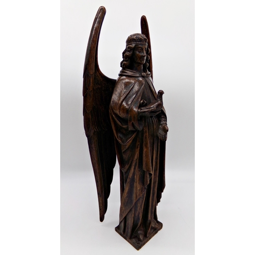 143 - Good quality antique Flemish oak carving of an angel holding a dove, 51cm high