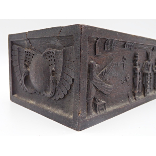 146 - Unusual antique carved oak rectangular vessel of Egyptian interest, with hand whittled well, the sid... 