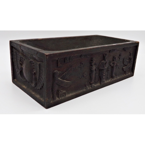 146 - Unusual antique carved oak rectangular vessel of Egyptian interest, with hand whittled well, the sid... 