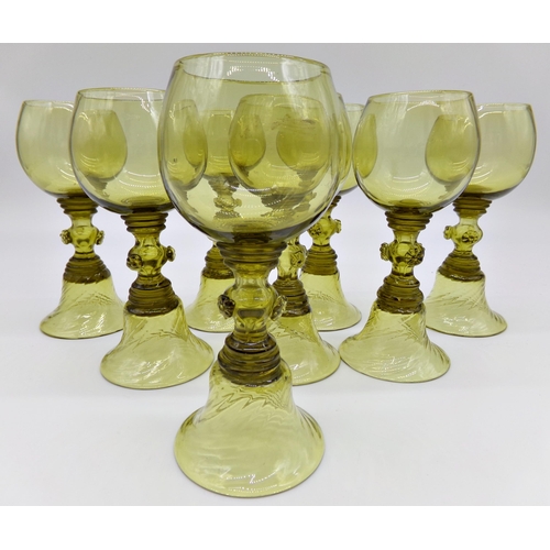 64 - Set of 8 'Liberty' green hock glasses, 16cm high