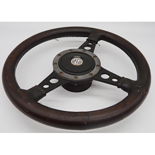 9 - Vintage MG three spoke steering wheel, with stitched leather grip, 35cm diameter