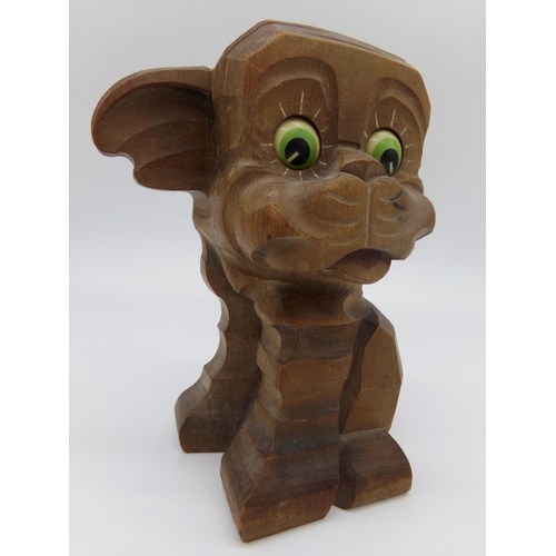 476 - Novelty carved wooden dog clock, with moving eyes, 17cm high