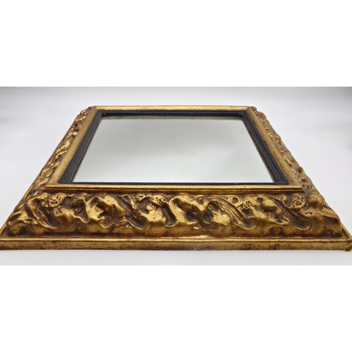 594 - 19th century gilt papier mache Medici mirror with original glass plate, 62 x 54cm