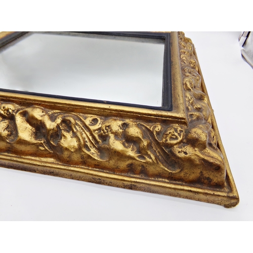 594 - 19th century gilt papier mache Medici mirror with original glass plate, 62 x 54cm