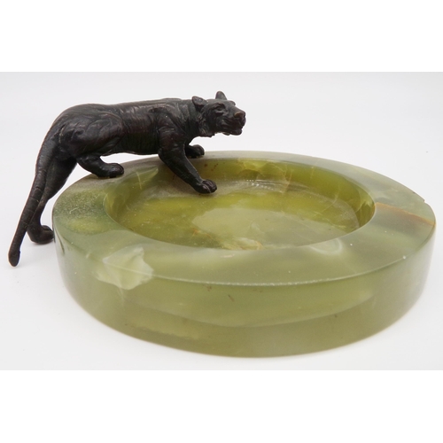 154 - Art deco green onyx ashtray mounted by a bronze tiger, 16cm long