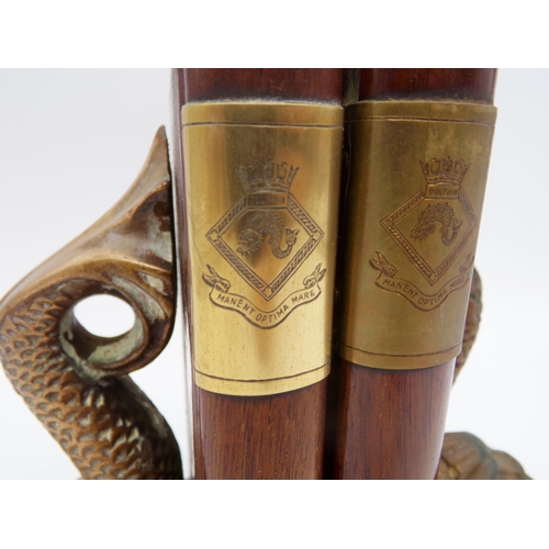 158 - HMS Dolphin - pair of bookends, with gilt cast metal dolphin brackets, with HMS Dolphin crest on the... 