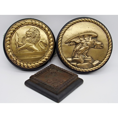 160 - Pair of antique polished bronze circular wall plaques, both cast in relief, one with an eagle the ot... 