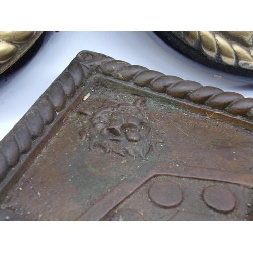 160 - Pair of antique polished bronze circular wall plaques, both cast in relief, one with an eagle the ot... 