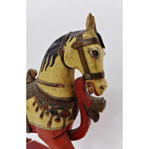 101 - Good quality Indian folk art carved wooden horse on wheels, with hand painted decoration, 82 x 86cm