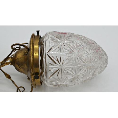 70 - Arts and Crafts gilt brass hanging lantern, fitted with a star cut glass shade 33cm high, with set o... 