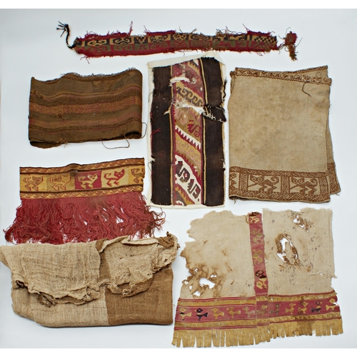 116 - Seven 12th century Peruvian Chancay textile pieces, comprising four fragments with animals and wildl... 