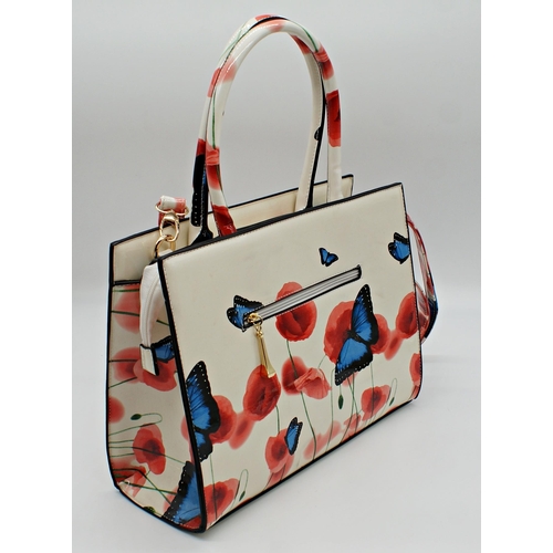 498 - Ted Baker Butterfly and poppy pattern bag and purse, the bag 27 x 34cm