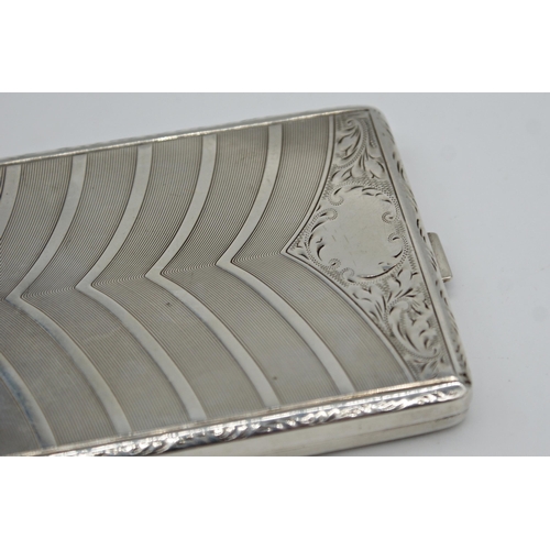 262 - Good quality continental white metal cigarette case, engraved with geometric and scrolled decoration... 