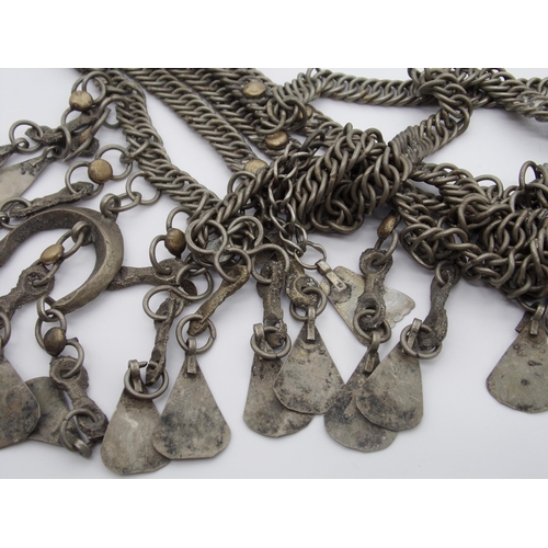 113 - Eastern tribal white metal necklace with unusual forged links and tassels