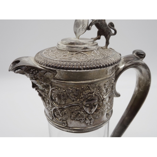 263 - Late Victorian silver and glass claret jug, mounted by a rampant lion, maker Horace Woodward & Co Lt... 