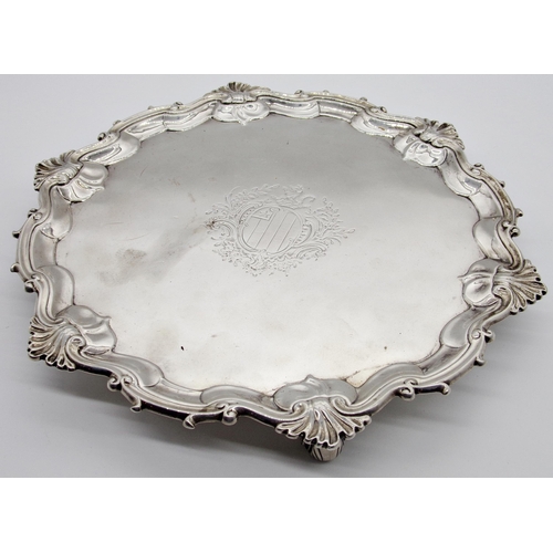 265 - George II silver salver, raised pie crust rim with cast scallop shell and scrolled border, central c... 