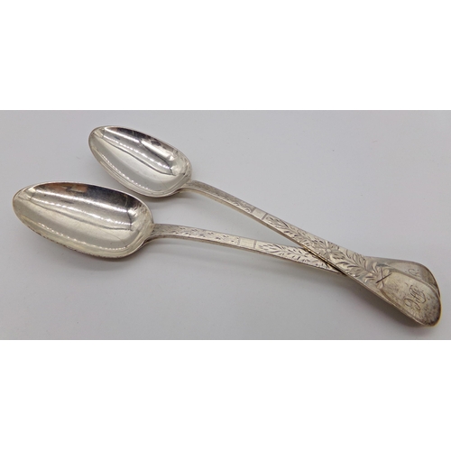 273 - Pair of Victorian silver Old English bright cut table spoons, maker John Le Gallais of Jersey, Londo... 