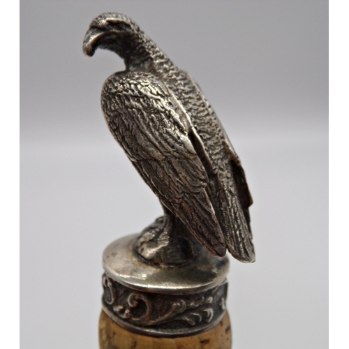 246 - Novelty cork bottle stop mounted by a cast silver eagle, maker SS TS, import marks, 10.5cm long, 2oz... 