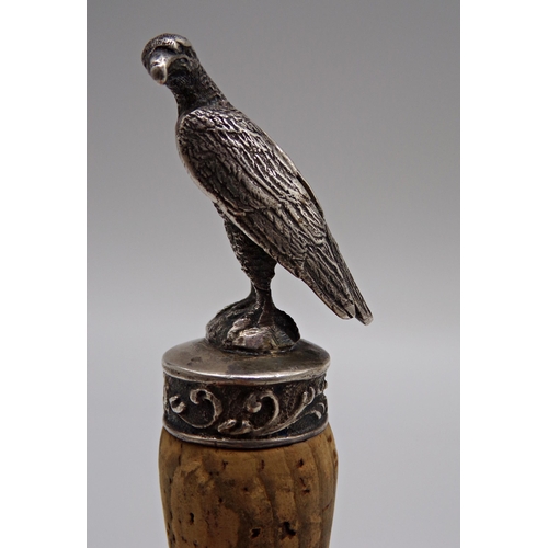 246 - Novelty cork bottle stop mounted by a cast silver eagle, maker SS TS, import marks, 10.5cm long, 2oz... 