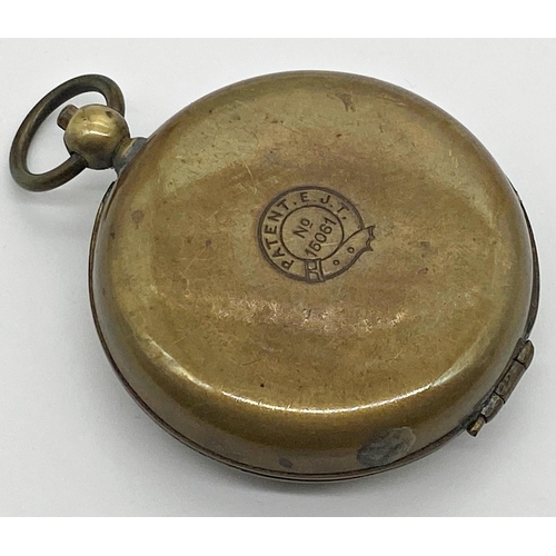 427 - Early 20th century brass cased pocket compass and telescopic drinking cup, 50mm case inscribed verso... 