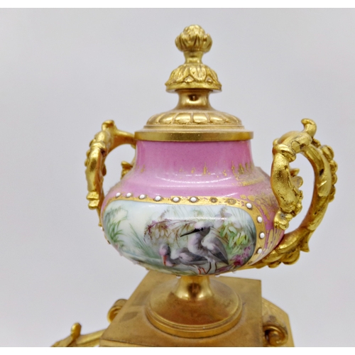 473 - Good quality French ormolu mantle clock, fitted with Sevres style porcelain panels hand painted with... 