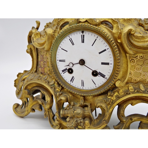 474 - Good quality French ormolu figural mantle clock, mounted by two Bacchus cherubs with further Rococo ... 