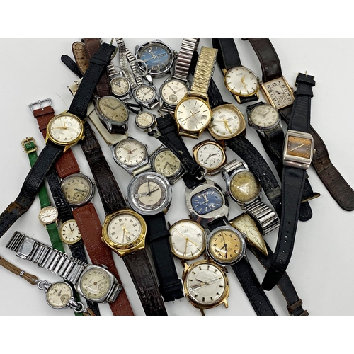 453 - An interesting selection of 29 gents and ladies vintage wrist watches, to include Omega, Tissot, Ham... 