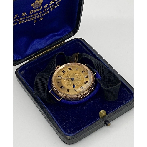 458 - J.B Dent & Sons 10ct gold watch with Roman numerals, floral etching to face, surrounding case etched... 