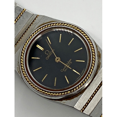 391 - Vintage Omega Constellation bi-colour ladies wristwatch, 26mm case, black dial with gilt hands and m... 