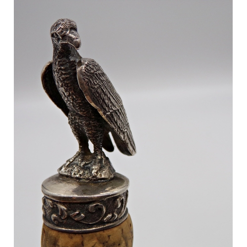 246 - Novelty cork bottle stop mounted by a cast silver eagle, maker SS TS, import marks, 10.5cm long, 2oz... 