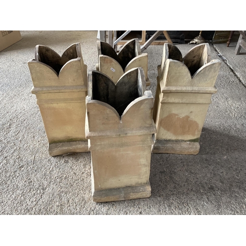 36 - Set of four clay chimney pots, 63cm high