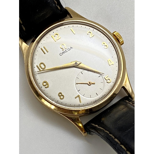 381 - Vintage Omega 9ct gold gents wristwatch, 34mm case, champagne dial with gilt hands and markers, subs... 