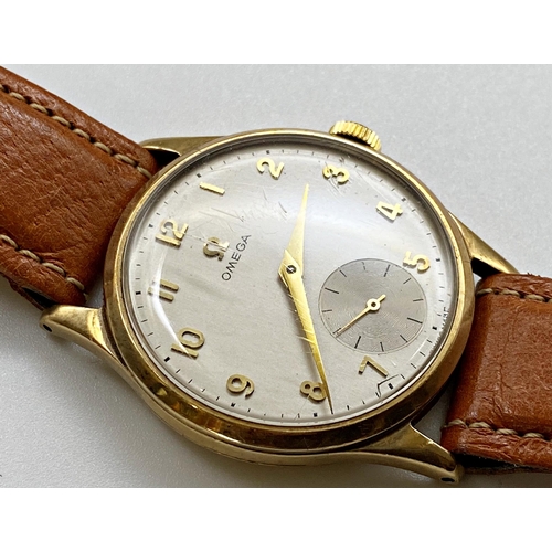 384 - Vintage Omega 9ct gents wristwatch, 34mm case, champagne dial with gilt hands and Arabic numerals, s... 