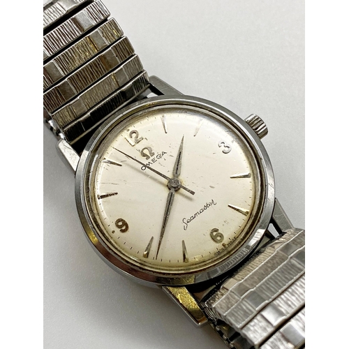 385 - Vintage Omega Seamaster stainless steel gents wristwatch, champagne dial with silver hands, markers ... 