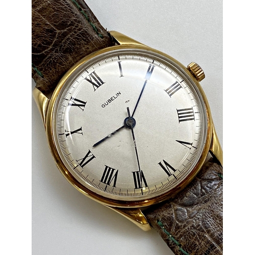 406 - Vintage Gubelin 9ct gents wristwatch, 36mm case, silver dial with black hands and roman numerals, pe... 