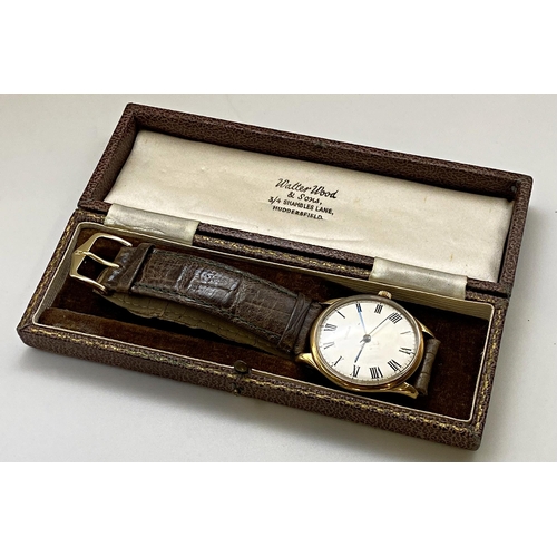 406 - Vintage Gubelin 9ct gents wristwatch, 36mm case, silver dial with black hands and roman numerals, pe... 