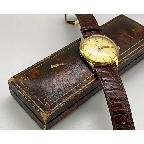 407 - Universal Geneve automatic 18ct gold gents wristwatch, 35mm case, textured gilt dial with gilt hands... 