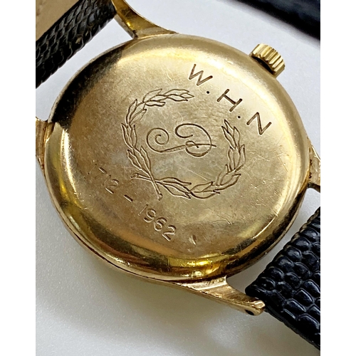 411 - Vintage Garrard 9ct gold mid size wristwatch, 30mm case, champagne dial with gilt hands and Arabic n... 