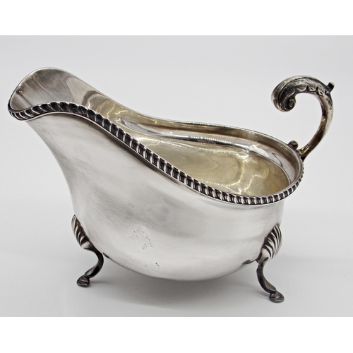 188 - Good quality Georgian style silver sauce boat, gadrooned rim, three shell feet, Maker JF & Son LTD, ... 