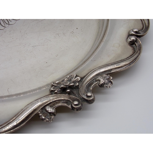 193 - Cast silver salver, with stylised scrolled floral rim, marker ‘Sterling’, 28cm diameter, 12.5oz appr... 