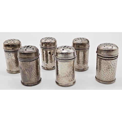 205 - Cased set of six sterling silver peppers, with hammered finish, inscribed 'International Sterling' t... 