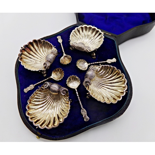 208 - Good quality cased set of four novelty scallop shell salts and spoons, the salts with cast scrolled ... 