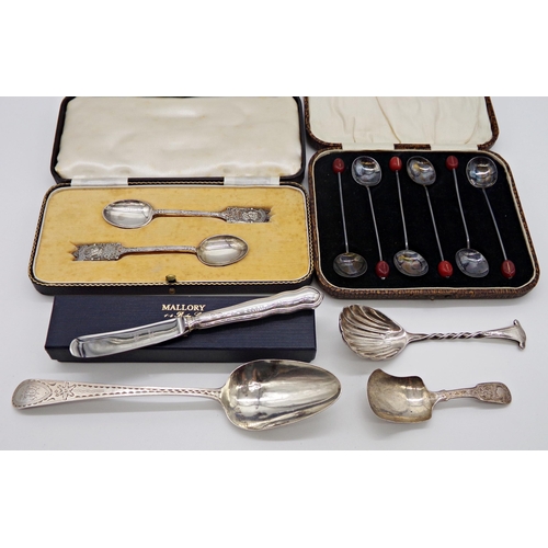 234 - Mixed collection of silver flatware to include a Georgian bright cut spoon, caddy spoon, cased set o... 