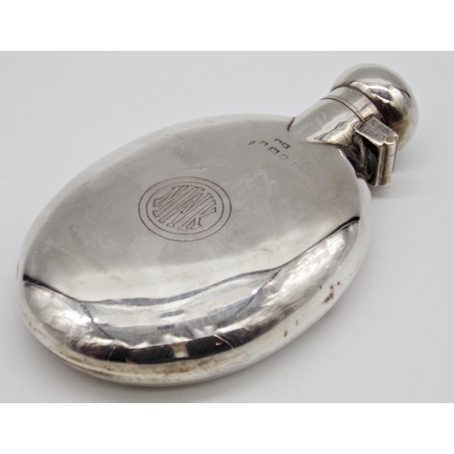 244 - Early 20th century silver oval hip flask, maker Henry Matthews, Birmingham (date letter worn), 12cm ... 