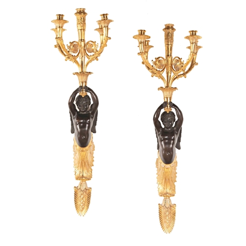 583 - Impressive pair of French empire bronze and ormolu figural wall sconces, five scrolled branches, on ... 