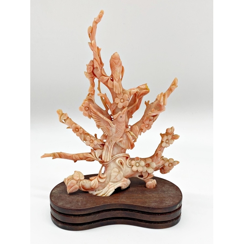 89 - Late 19th / early 20th century Chinese angel skin coral carving of birds in a tree, hardwood plinth ... 