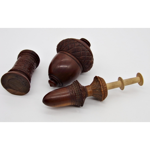 129 - Novelty antique treen nutmeg grater in the form of an acorn, 7.5cm long, with a further treen bobbin... 